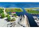 Aerial view of a waterfront neighborhood showcasing the boat ramp and marina at 512 Maryland Ave, St Cloud, FL 34769
