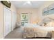 Comfortable bedroom with a queen-size bed, sliding doors to a balcony, and ample closet space at 607 Gran Bahama Blvd # B29/U607, Davenport, FL 33897