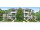 Inviting green condo building featuring white stairways, palm trees and well-maintained landscaping at 607 Gran Bahama Blvd # B29/U607, Davenport, FL 33897
