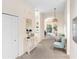 Hallway with carpet flooring, light walls, and modern decor that leads to other rooms at 607 Gran Bahama Blvd # B29/U607, Davenport, FL 33897