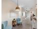 Hallway features neutral walls, carpeted flooring, and decorative light fixtures at 607 Gran Bahama Blvd # B29/U607, Davenport, FL 33897