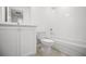 Bright bathroom featuring a tub with shower, white tile, and a modern vanity at 6501 Cyrils Dr, St Cloud, FL 34771