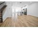 Spacious living room boasts an open floor plan to the kitchen and stainless steel appliances at 6501 Cyrils Dr, St Cloud, FL 34771