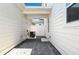 Private outdoor patio with pavers, white fencing, and access to the home at 6501 Cyrils Dr, St Cloud, FL 34771