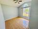 Bright and airy bedroom featuring tile flooring, and natural light from a window at 664 Eagle Pointe S, Kissimmee, FL 34746
