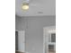 Main bedroom features a ceiling fan, vaulted ceilings, and an ensuite bathroom with vanity at 664 Eagle Pointe S, Kissimmee, FL 34746