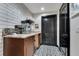Charming bar area featuring subway tile, modern countertops, and a classic popcorn machine at 6761 Valhalla Way, Windermere, FL 34786