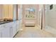 Bathroom showcasing a large mirror, walk in shower and custom vanity with granite countertops at 6761 Valhalla Way, Windermere, FL 34786