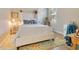 Inviting bedroom with a comfortable queen-sized bed, plush rug, and ample natural light at 6761 Valhalla Way, Windermere, FL 34786