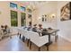 Bright dining area with floor to ceiling windows and views to the outside at 6761 Valhalla Way, Windermere, FL 34786