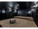 Stunning home theater with a projector, custom lighting, and comfortable seating area at 6761 Valhalla Way, Windermere, FL 34786