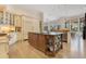 Spacious kitchen features an island, custom cabinets, and stainless appliances at 6761 Valhalla Way, Windermere, FL 34786