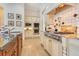 Well-appointed kitchen featuring stainless steel appliances, custom cabinets, and a gas range at 6761 Valhalla Way, Windermere, FL 34786