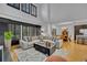 Bright living room with high ceilings and windows that bring in lots of natural light at 6970 Piazza St, Orlando, FL 32819
