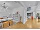 Open concept floor plan with modern office that leads into a bright living area at 6970 Piazza St, Orlando, FL 32819