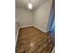 Bedroom with light-colored walls and wood-look flooring at 7673 Ripplepointe Way, Windermere, FL 34786