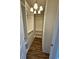 Walk-in closet with custom shelving and lighting at 7673 Ripplepointe Way, Windermere, FL 34786