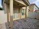 Outdoor patio with brick pavers, stucco columns, and a privacy fence at 7673 Ripplepointe Way, Windermere, FL 34786