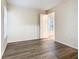 Bedroom featuring hardwood flooring and natural light from the window at 7865 Sugar View Ct # 7865, Orlando, FL 32819