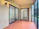 Screened lanai features sliding glass doors leading to the interior of the home at 7865 Sugar View Ct # 7865, Orlando, FL 32819