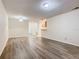 Bright living room features modern flooring and an open floor plan with neutral paint at 7865 Sugar View Ct # 7865, Orlando, FL 32819