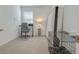 Bright bedroom featuring soft carpet and a desk, suitable for an office or guest room at 824 Ofanto Way, Haines City, FL 33844