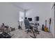 A bedroom is set up as a music studio with guitars, speakers, and computer equipment at 824 Ofanto Way, Haines City, FL 33844