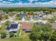 Neighborhood aerial showcasing the home's location and surrounding community in a lush, green area at 8322 Cascade Oaks Dr, Orlando, FL 32822