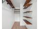 This walk-in closet provides ample storage with its adjustable shelving and rod system at 8322 Cascade Oaks Dr, Orlando, FL 32822
