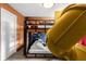 Playful bedroom featuring themed bunk beds, a yellow slide, and fun, creative wall art at 9020 Stinger Dr, Davenport, FL 33896