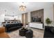 Spacious living area with modern decor, television, and open view to the kitchen at 9020 Stinger Dr, Davenport, FL 33896