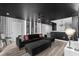 Stylish living room with a black and white theme and unique decor at 9020 Stinger Dr, Davenport, FL 33896