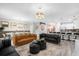 Spacious open-concept living area connected to the kitchen and dining room at 9020 Stinger Dr, Davenport, FL 33896