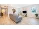 Bright living room featuring natural light, tile floors, and backyard views at 10364 Shive Island Ct, Orlando, FL 32827
