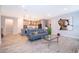 Open-concept living room with modern finishes, natural light, and backyard views at 10364 Shive Island Ct, Orlando, FL 32827