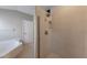 Shower with tile surround and a built-in niche at 12303 Bohannon Blvd, Orlando, FL 32824