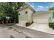 Two car garage with a basketball hoop in the driveway at 1321 Artisan E Ave, Celebration, FL 34747