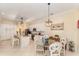 Charming kitchen with granite countertops, stainless steel appliances, breakfast bar and casual dining area at 1321 Artisan E Ave, Celebration, FL 34747