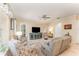 Bright living room featuring tile floors, neutral walls, and a ceiling fan at 1321 Artisan E Ave, Celebration, FL 34747