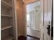 View into bathroom featuring tiled floor, walk-in shower with curtain and neutral colored walls at 1413 11Th St, St Cloud, FL 34769