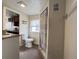 Bathroom view, showing a sink with granite countertops and a view into the kitchen at 1413 11Th St, St Cloud, FL 34769