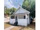 Charming home with a covered front porch and a well-maintained yard at 1413 11Th St, St Cloud, FL 34769