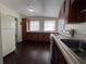 Kitchen features a sink, stove, and refrigerator at 1413 11Th St, St Cloud, FL 34769