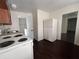 Kitchen with updated appliances and a doorway at 1413 11Th St, St Cloud, FL 34769