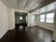 An inviting living room with a neutral color scheme and hardwood floors at 1413 11Th St, St Cloud, FL 34769