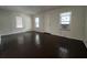 Living room with lots of natural light and dark hardwood floors at 1413 11Th St, St Cloud, FL 34769