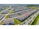 Aerial view of a large residential community with well-maintained landscaping and roadways at 14416 Orchid Island Dr, Orlando, FL 32827