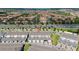 Aerial view of newly built townhomes with manicured landscaping situated near a busy highway at 14416 Orchid Island Dr, Orlando, FL 32827
