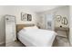 Cozy bedroom with a comfortable bed, stylish decor, and abundant natural light at 14416 Orchid Island Dr, Orlando, FL 32827