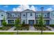 Charming townhome with manicured landscaping and welcoming front entrance at 14416 Orchid Island Dr, Orlando, FL 32827